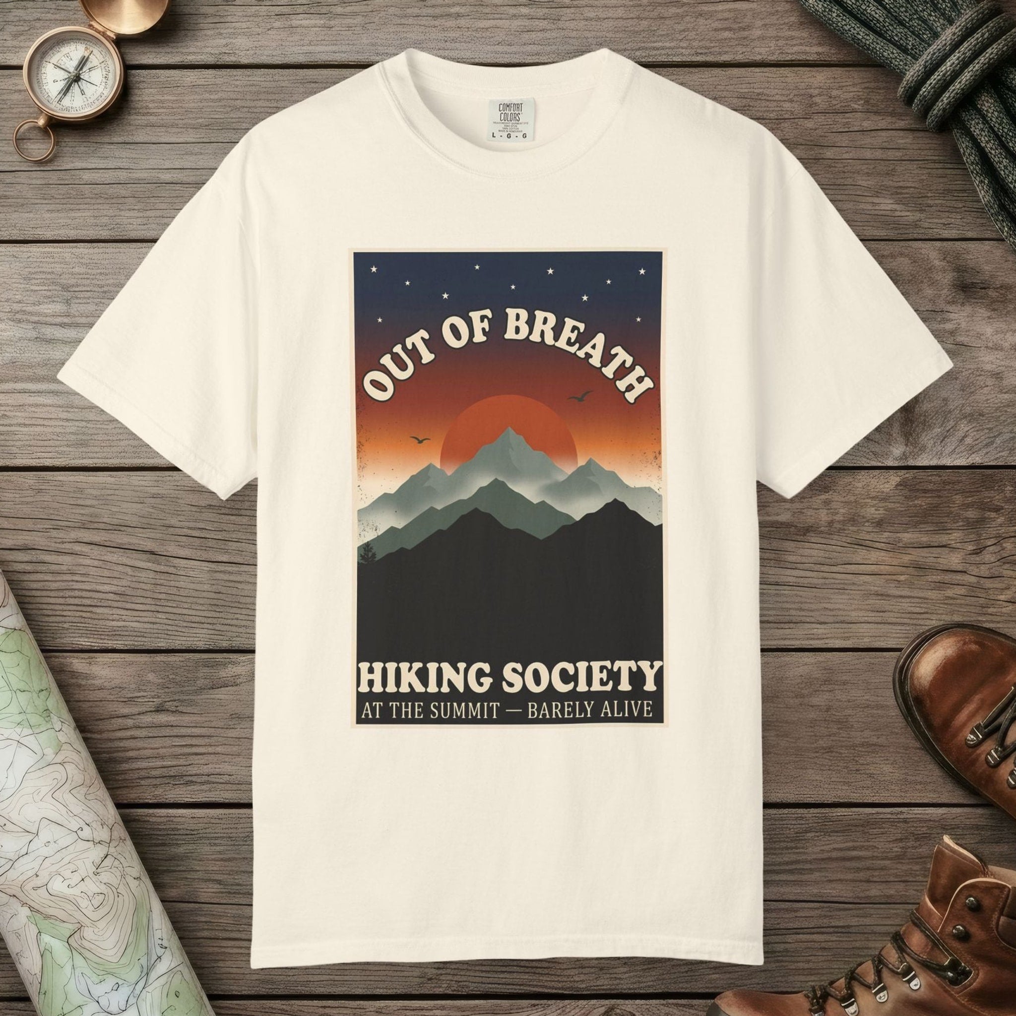 Ivory color unisex graphic t-shirt with "Out Of Breath Barely Alive" design