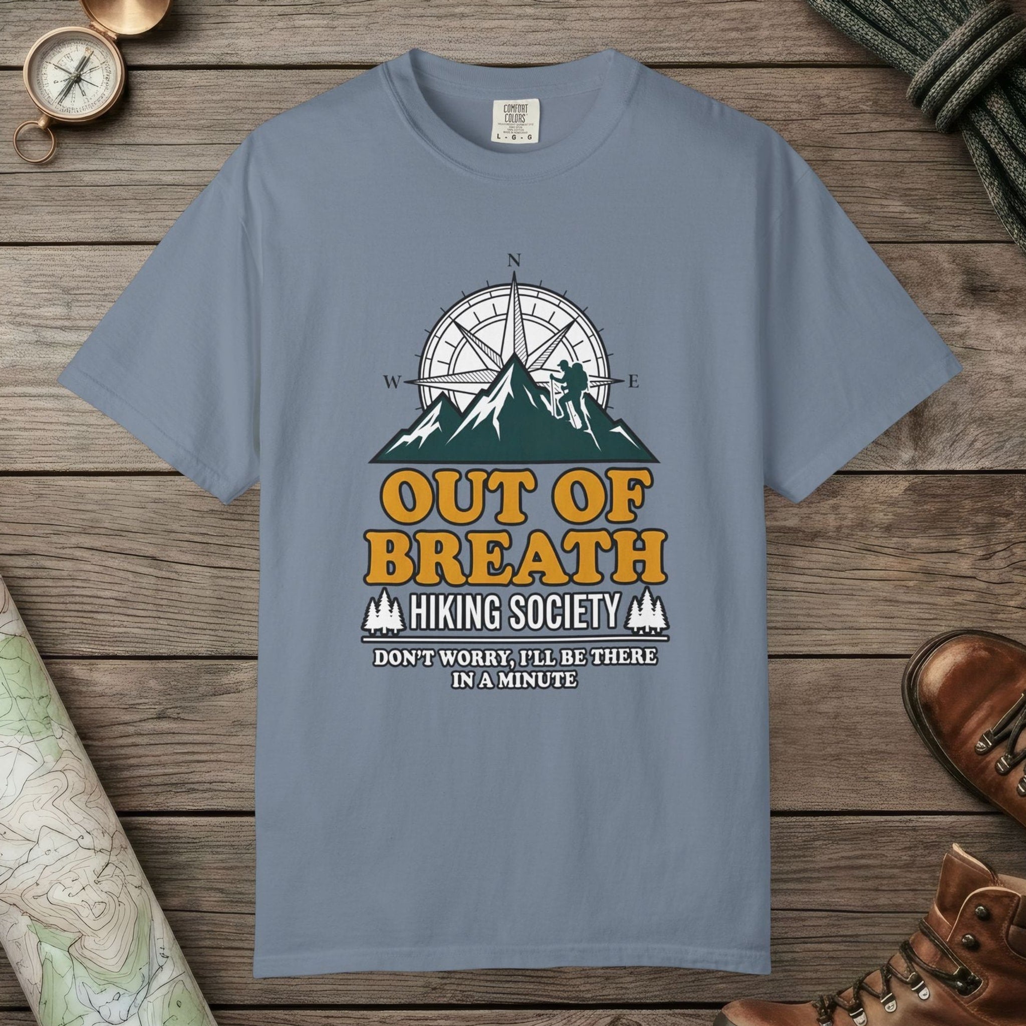 Blue Jean color unisex graphic t-shirt with "Out Of Breath Hiking Society" design