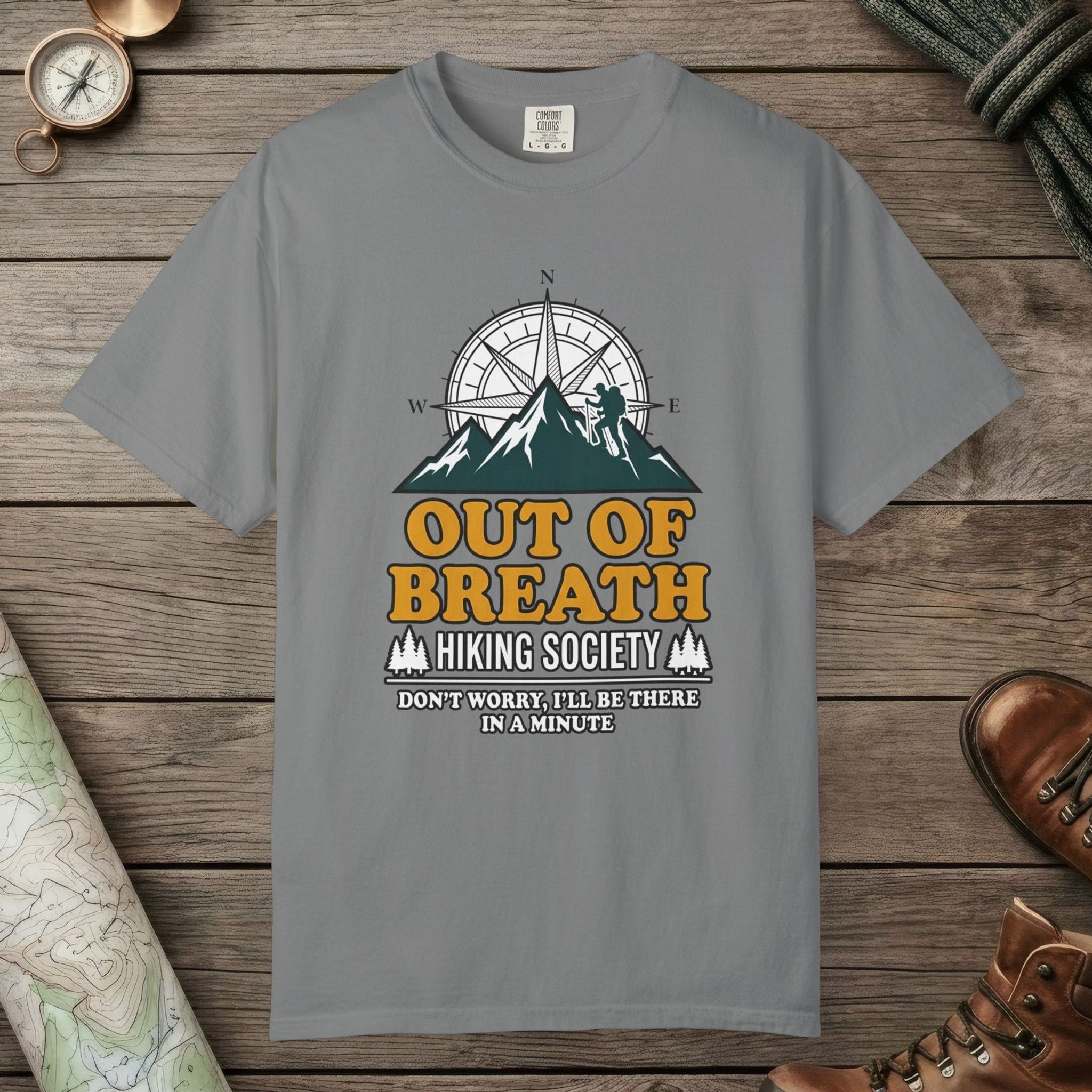 Grey color unisex graphic t-shirt with "Out Of Breath Hiking Society" design
