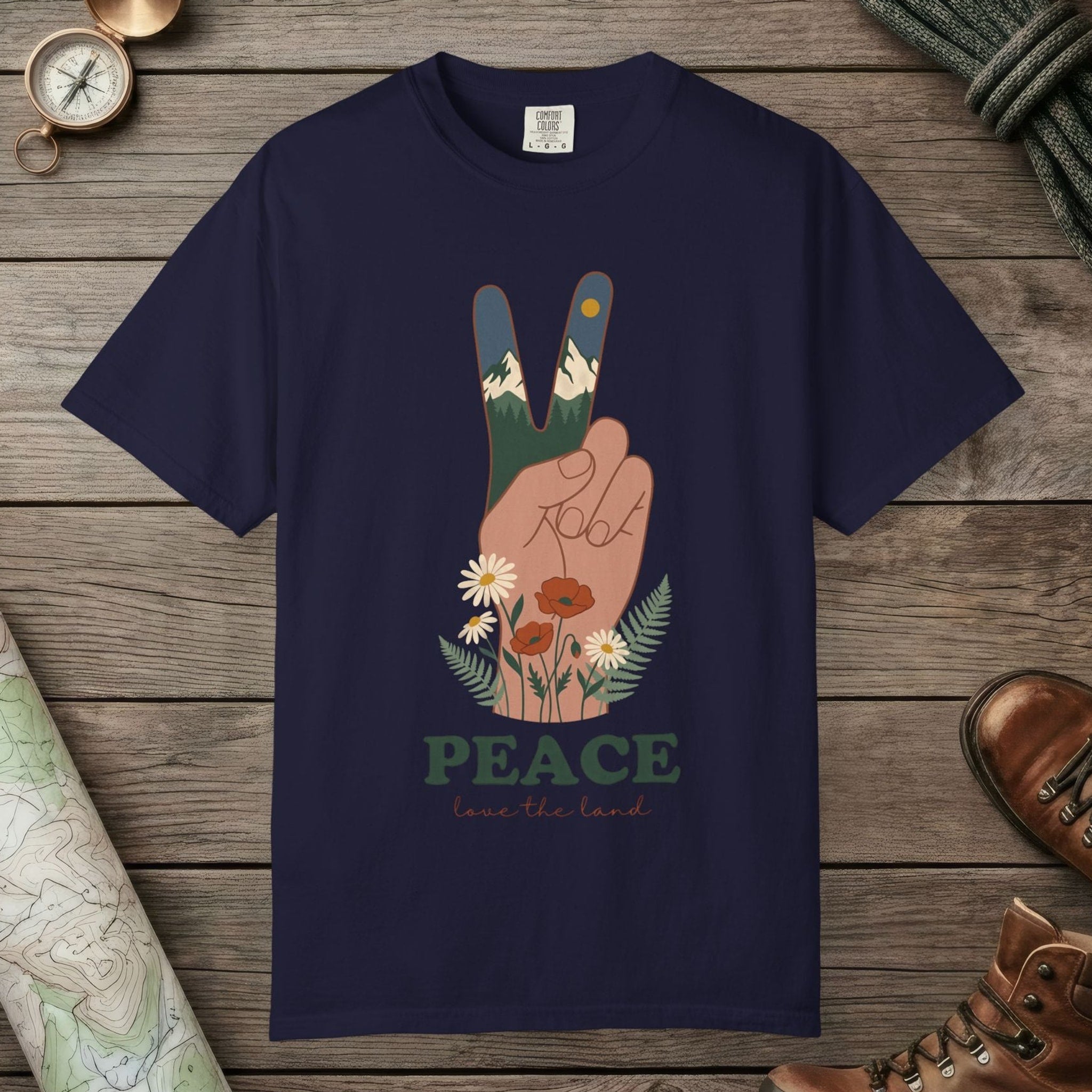 True Navy color unisex graphic t-shirt with "Peace Love The Land" design