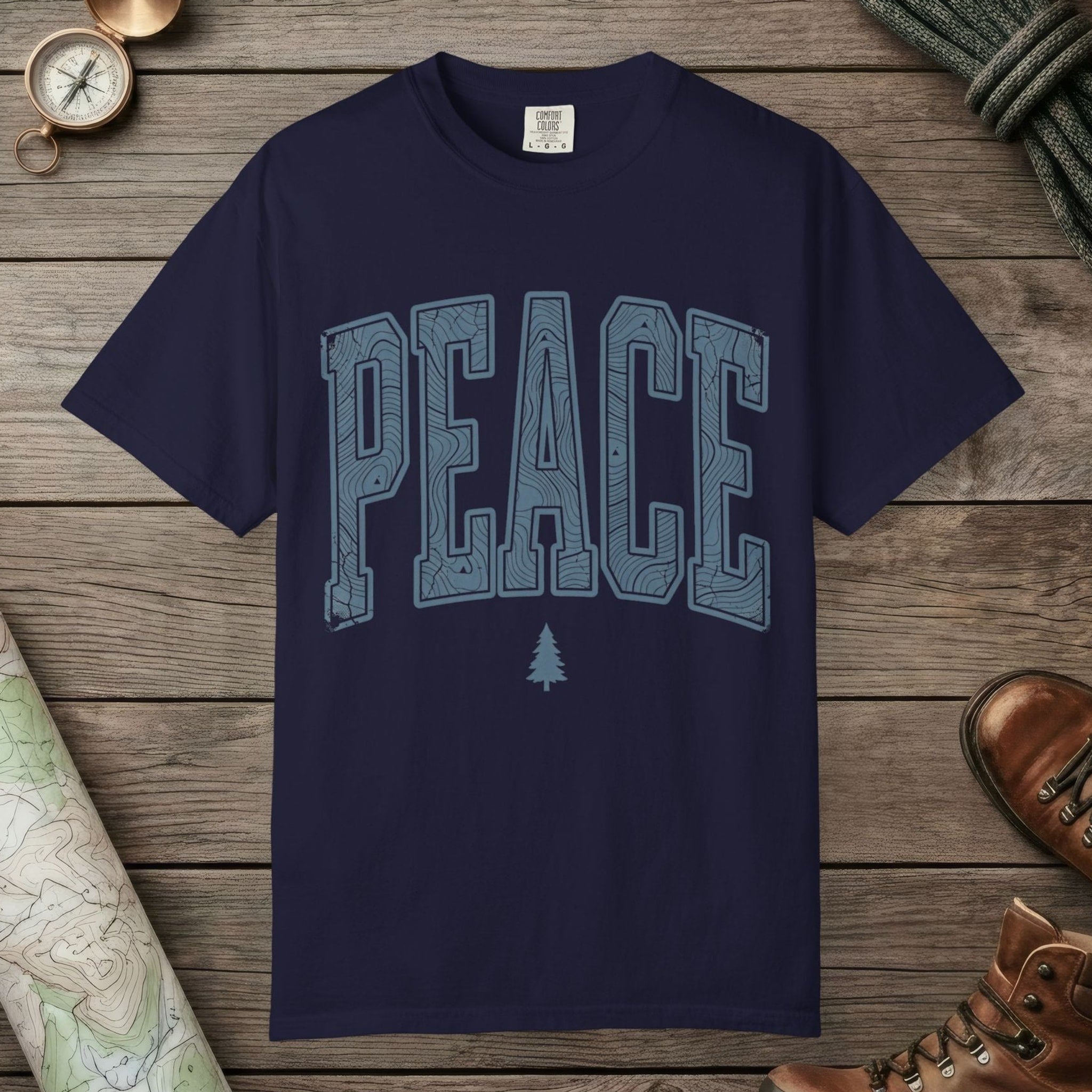 True Navy color unisex graphic t-shirt with "Peace Terrain" design