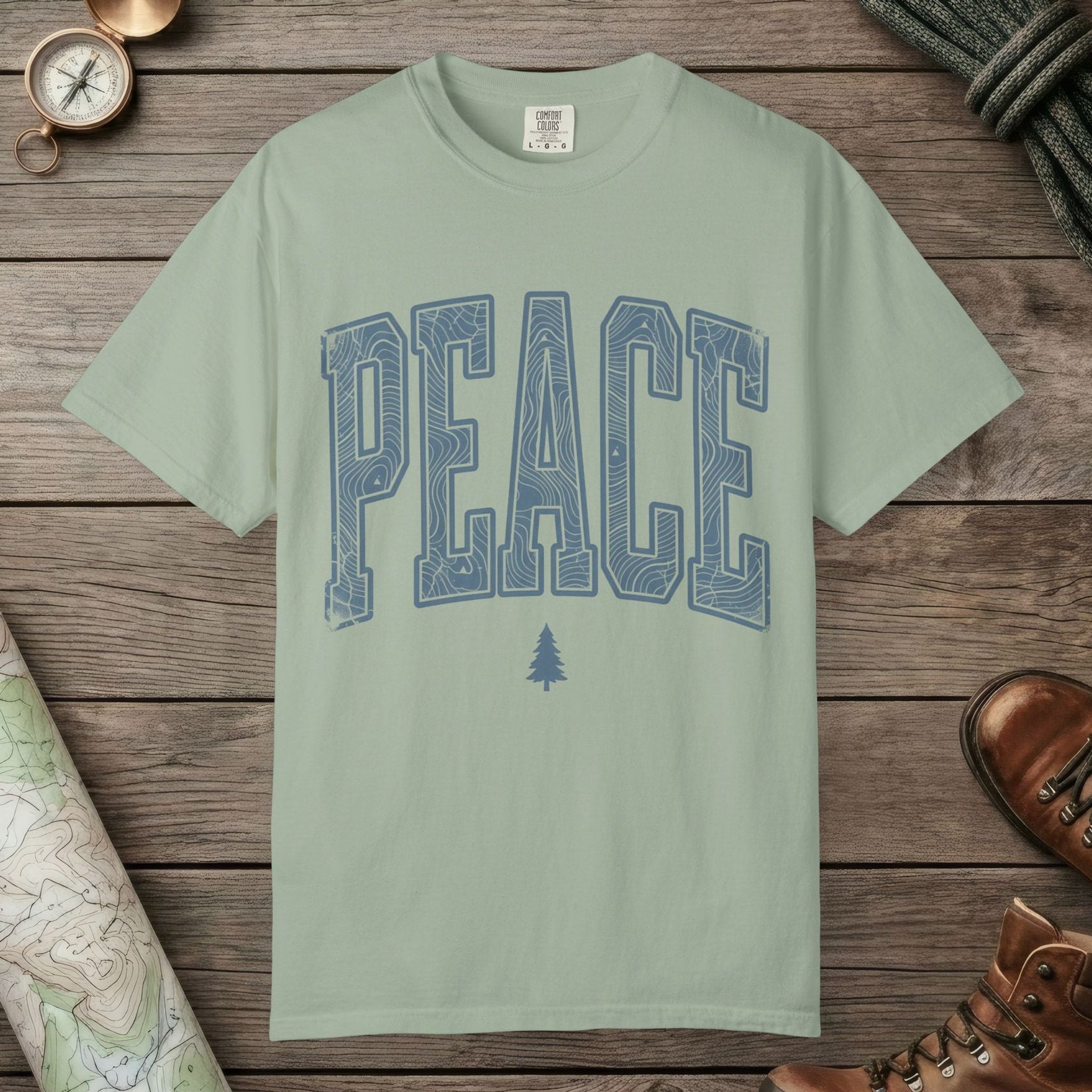 Bay color unisex graphic t-shirt with "Peace Terrain" design