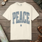 Ivory color unisex graphic t-shirt with "Peace Terrain" design