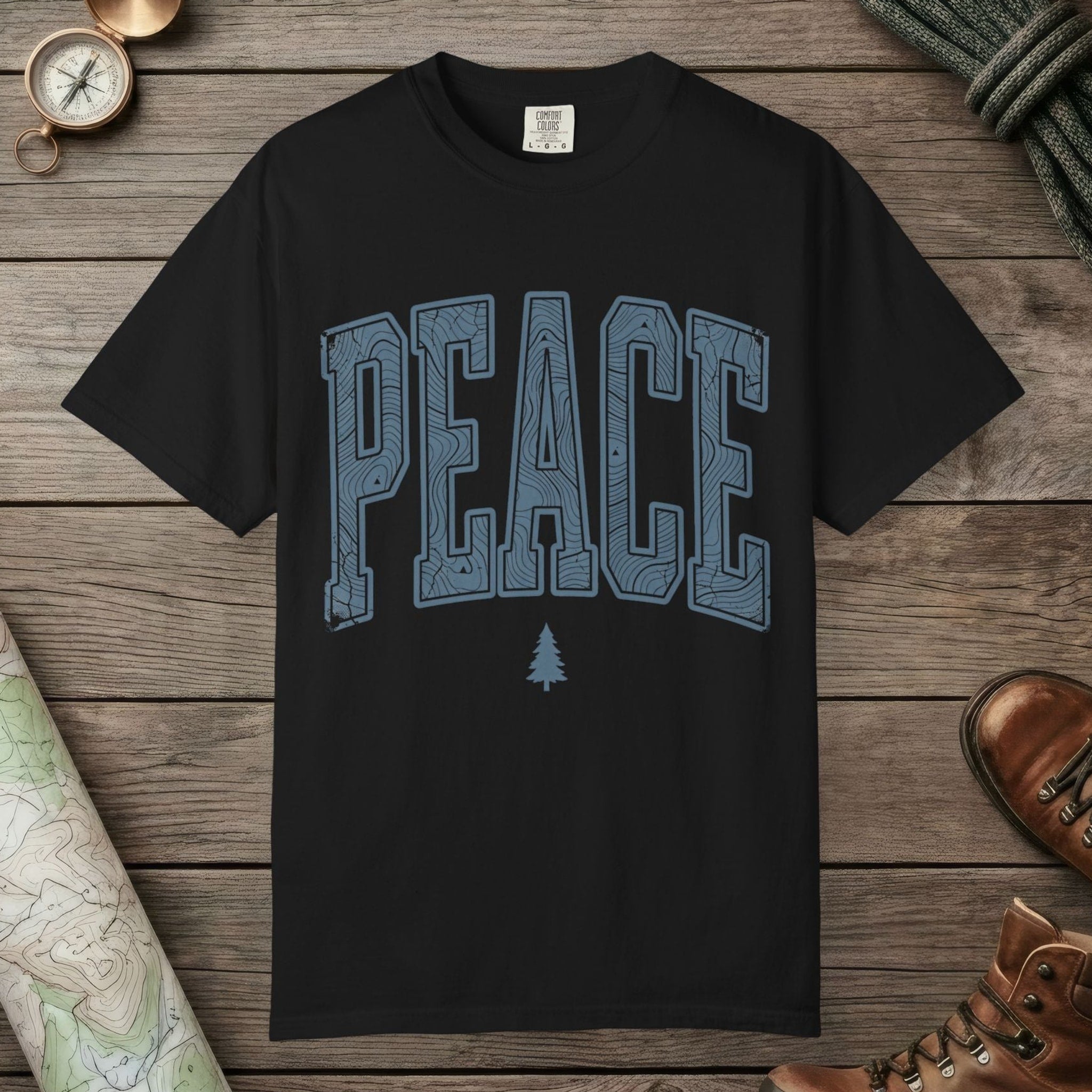 Black color unisex graphic t-shirt with "Peace Terrain" design