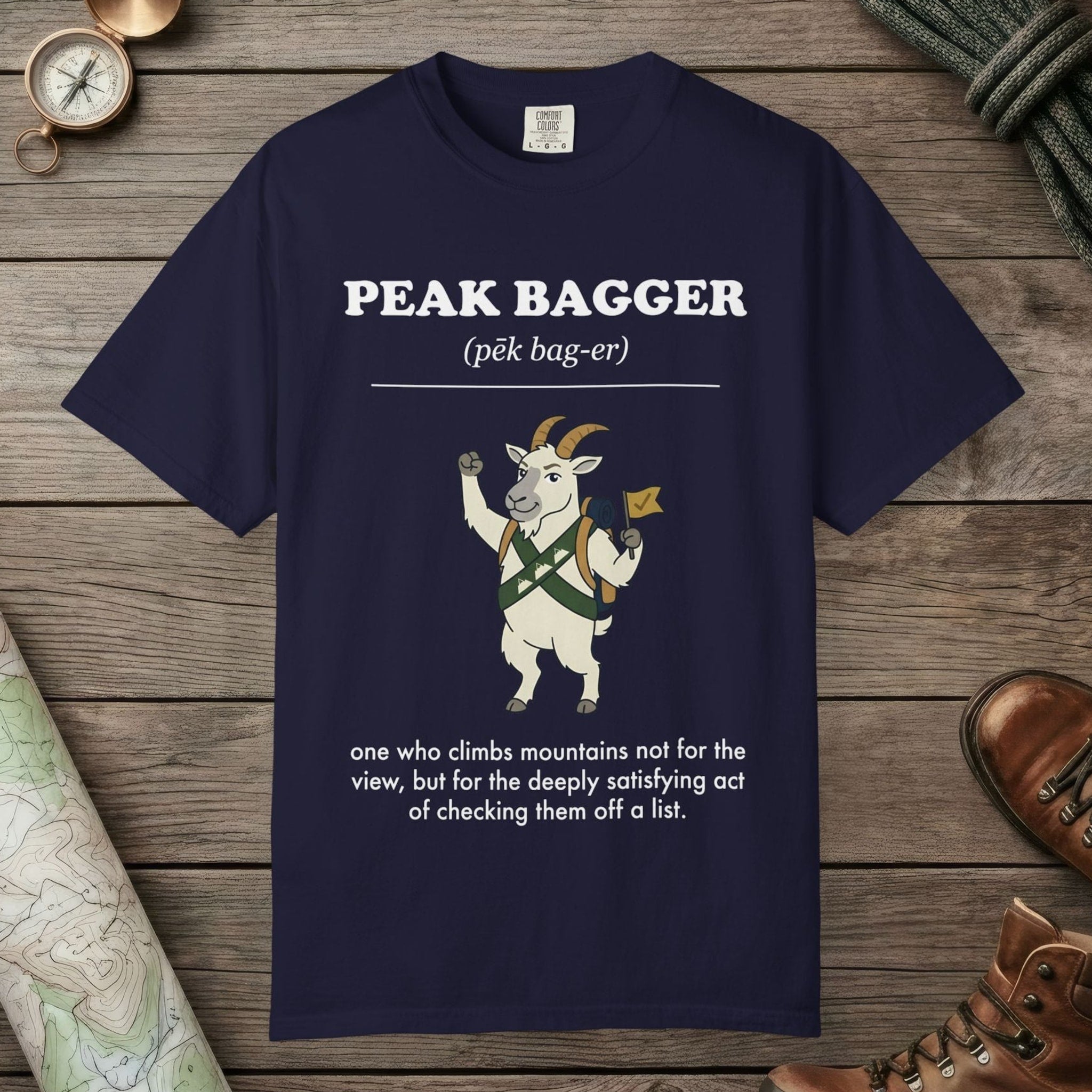 True Navy color unisex graphic t-shirt with "Peak Bagger Definition" design