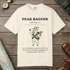 Ivory color unisex graphic t-shirt with "Peak Bagger Definition" design