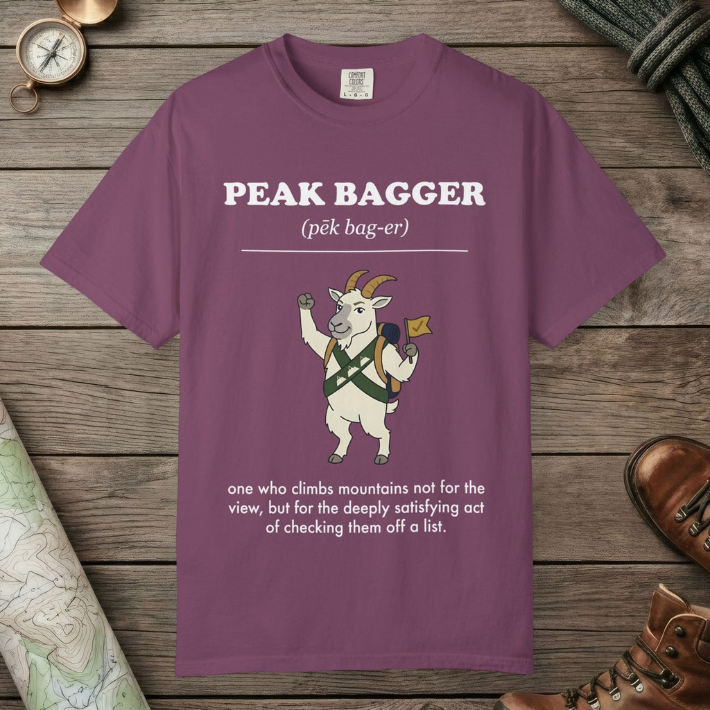 Berry color unisex graphic t-shirt with "Peak Bagger Definition" design