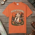 Burnt Orange color unisex graphic t-shirt with "Possum Paranormal" design