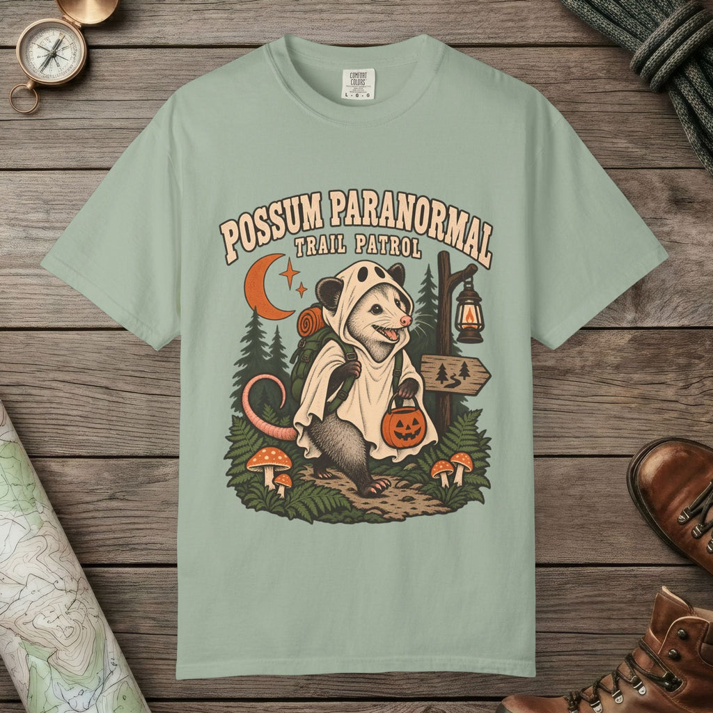 Bay color unisex graphic t-shirt with "Possum Paranormal" design