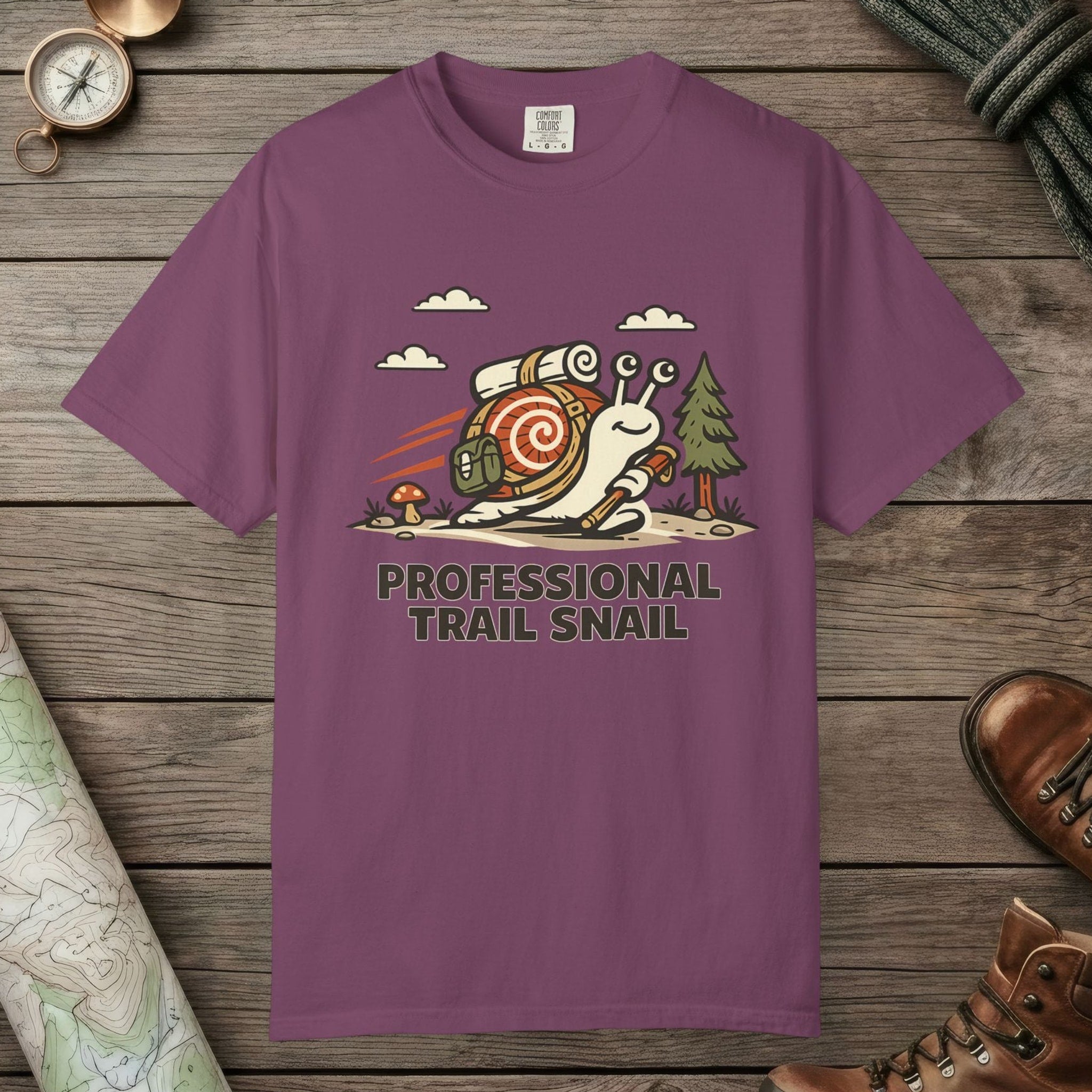 Berry color unisex graphic t-shirt with "Professional Trail Snail" design