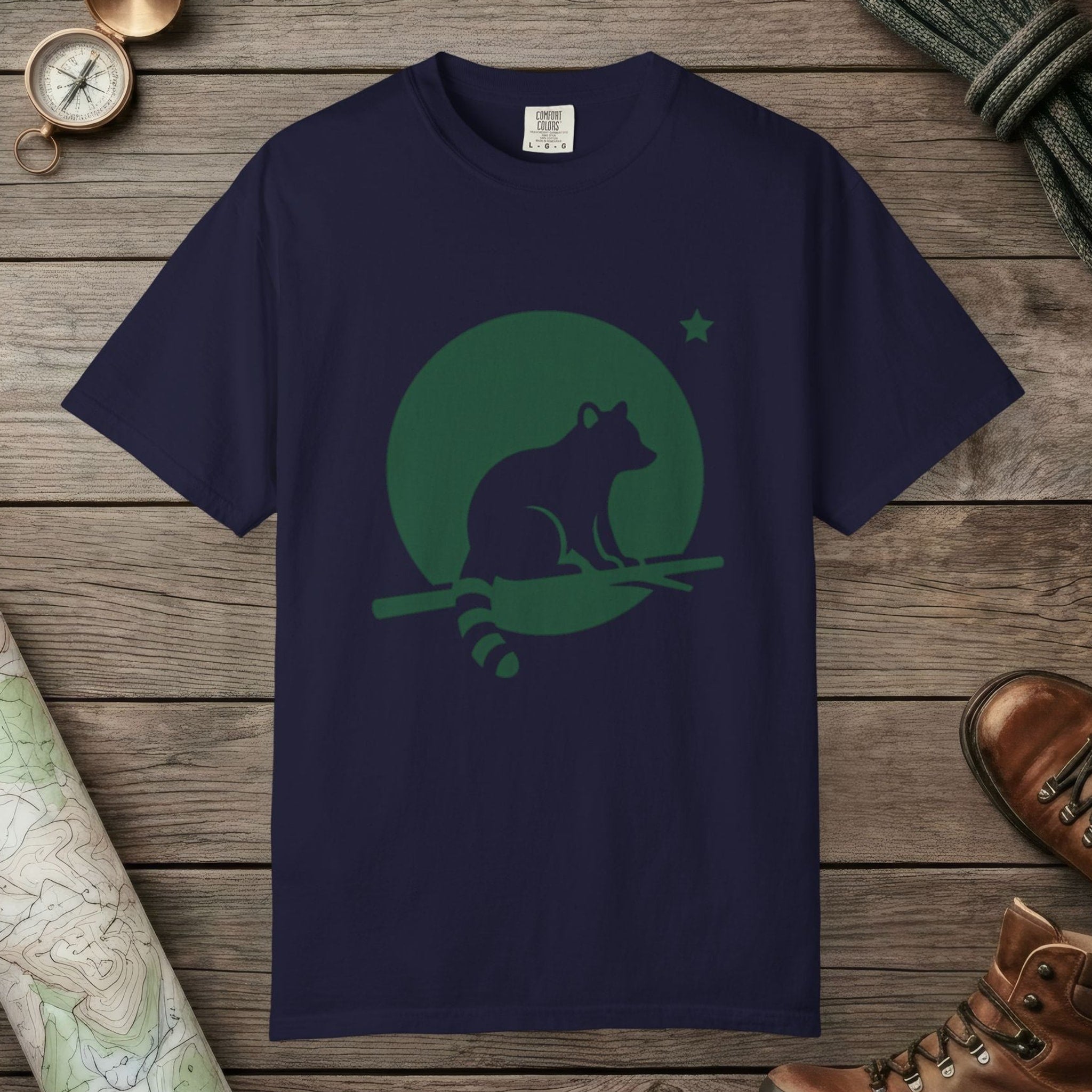 True Navy color unisex graphic t-shirt with "Raccoon Moon Silhouette" design