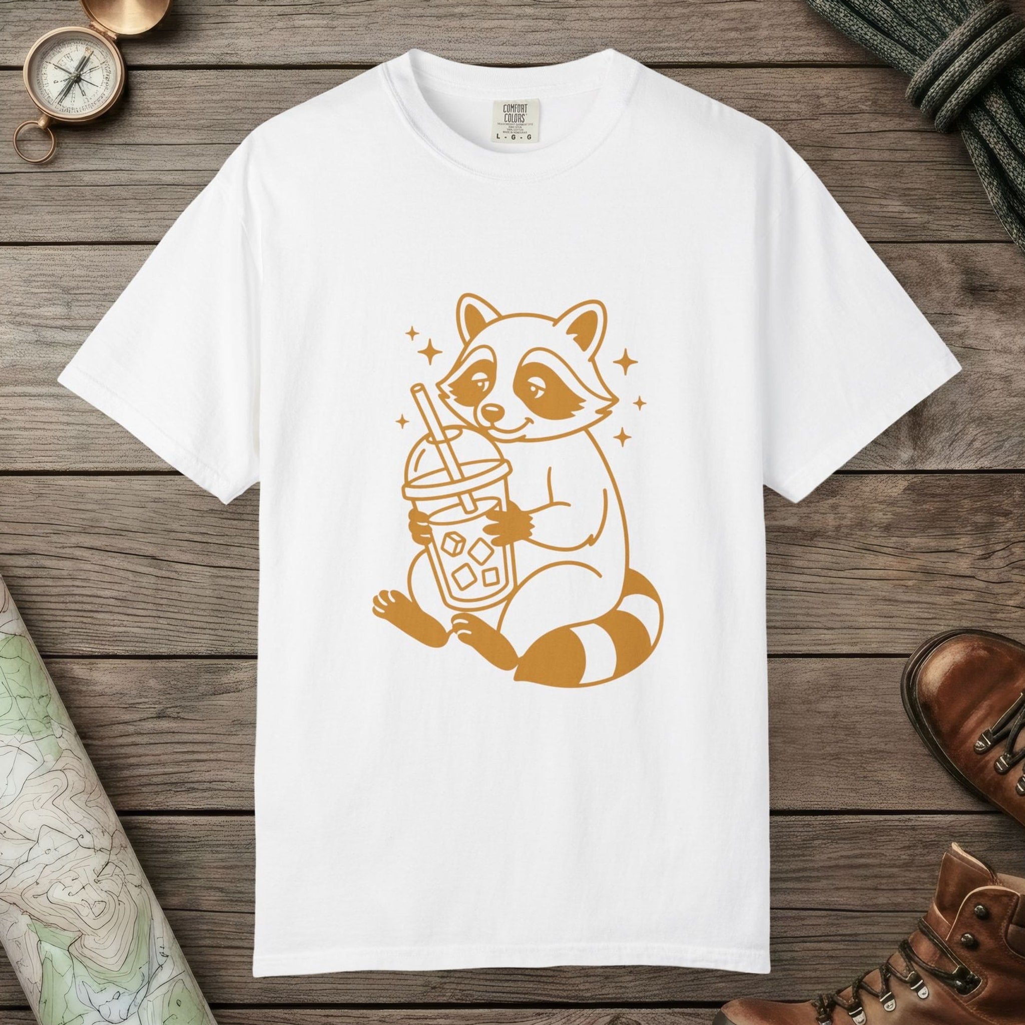White color unisex graphic t-shirt with "Raccoon with Iced Drink" design