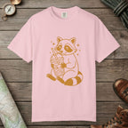 Blossom color unisex graphic t-shirt with "Raccoon with Iced Drink" design