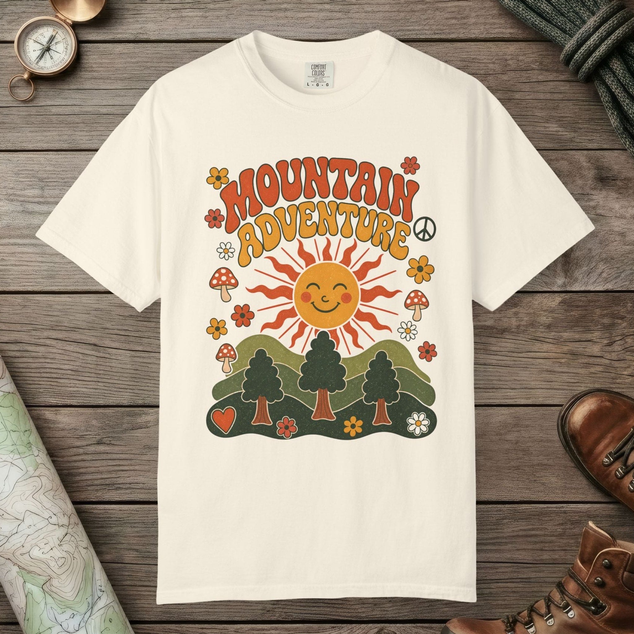 Ivory color unisex graphic t-shirt with "Retro Groovy Mountain Adventure" design