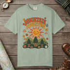 Bay color unisex graphic t-shirt with "Retro Groovy Mountain Adventure" design