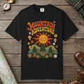Black color unisex graphic t-shirt with "Retro Groovy Mountain Adventure" design