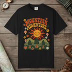 Black color unisex graphic t-shirt with "Retro Groovy Mountain Adventure" design