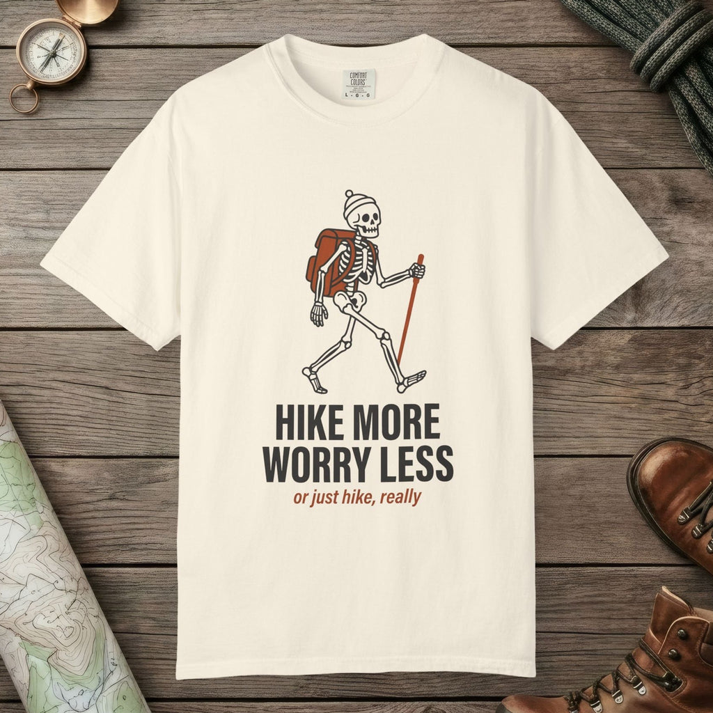 Ivory color unisex graphic t-shirt with "Skeleton Hiking" design