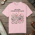 Blossom color unisex graphic t-shirt with "Skeleton in Wildflower Field" design
