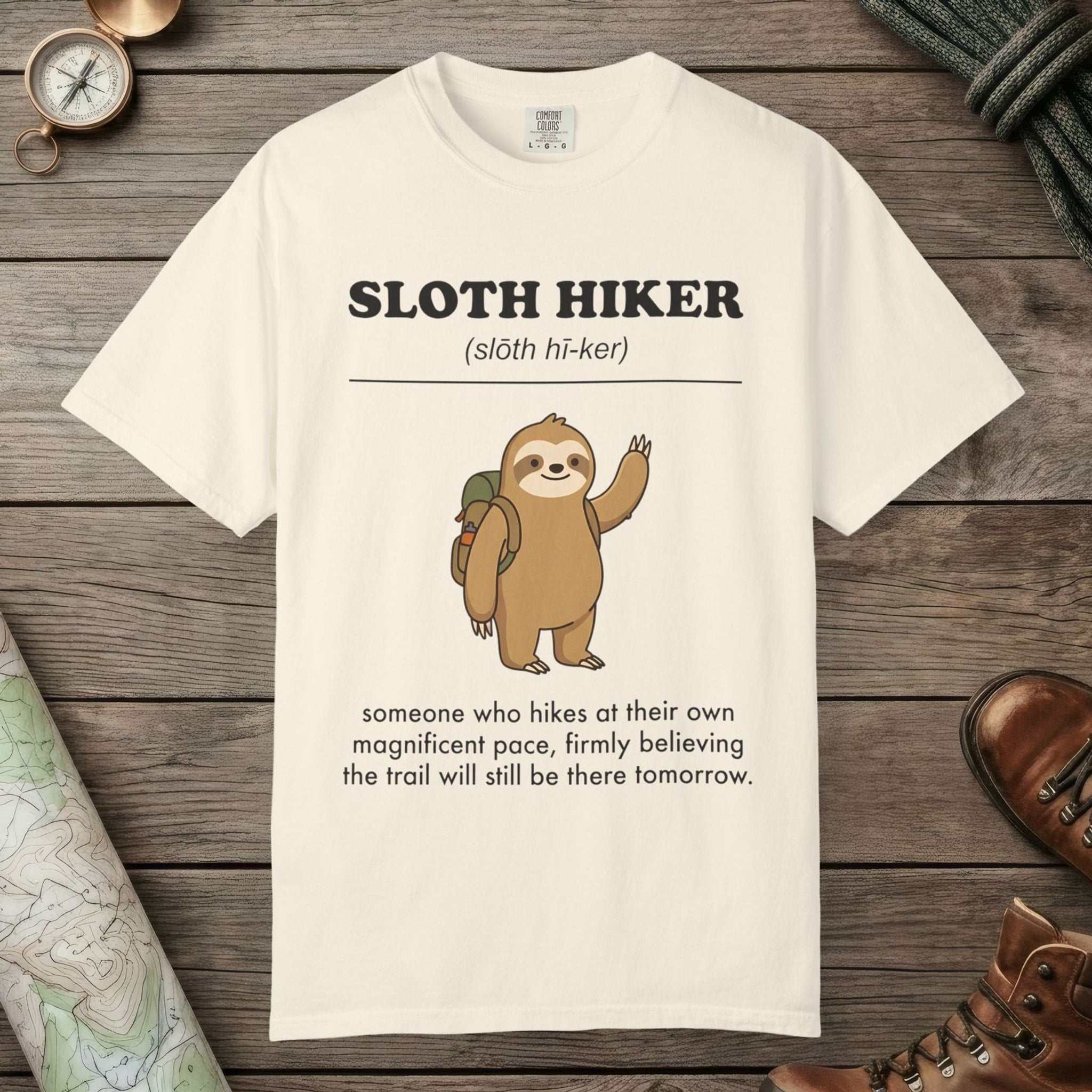 Ivory color unisex graphic t-shirt with "Sloth Hiker Definition 2" design