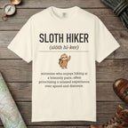 Ivory color unisex graphic t-shirt with "Sloth Hiker Definition" design