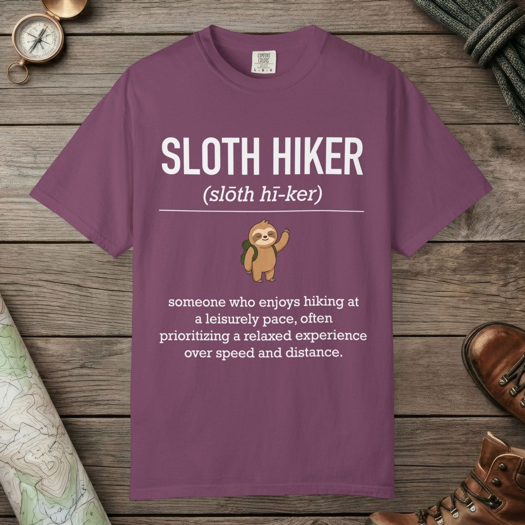 Berry color unisex graphic t-shirt with "Sloth Hiker Definition" design