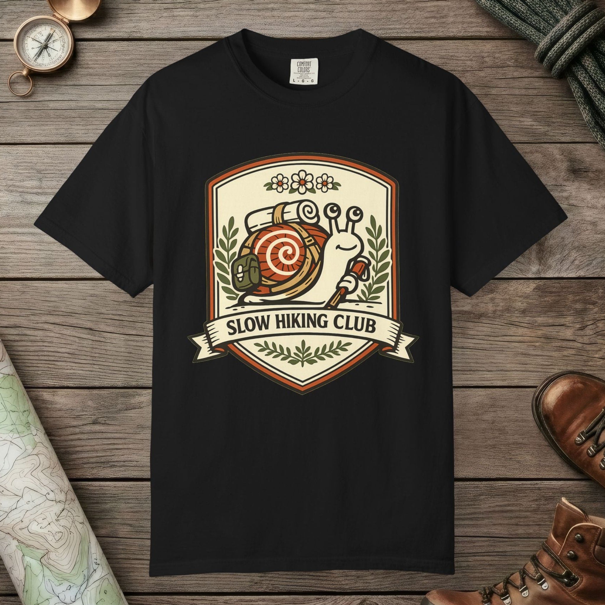 Black color unisex graphic t-shirt with "Slow Hiking Club" design