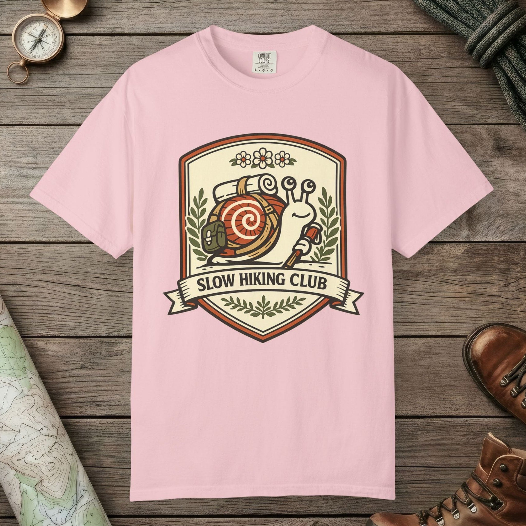 Blossom color unisex graphic t-shirt with "Slow Hiking Club" design