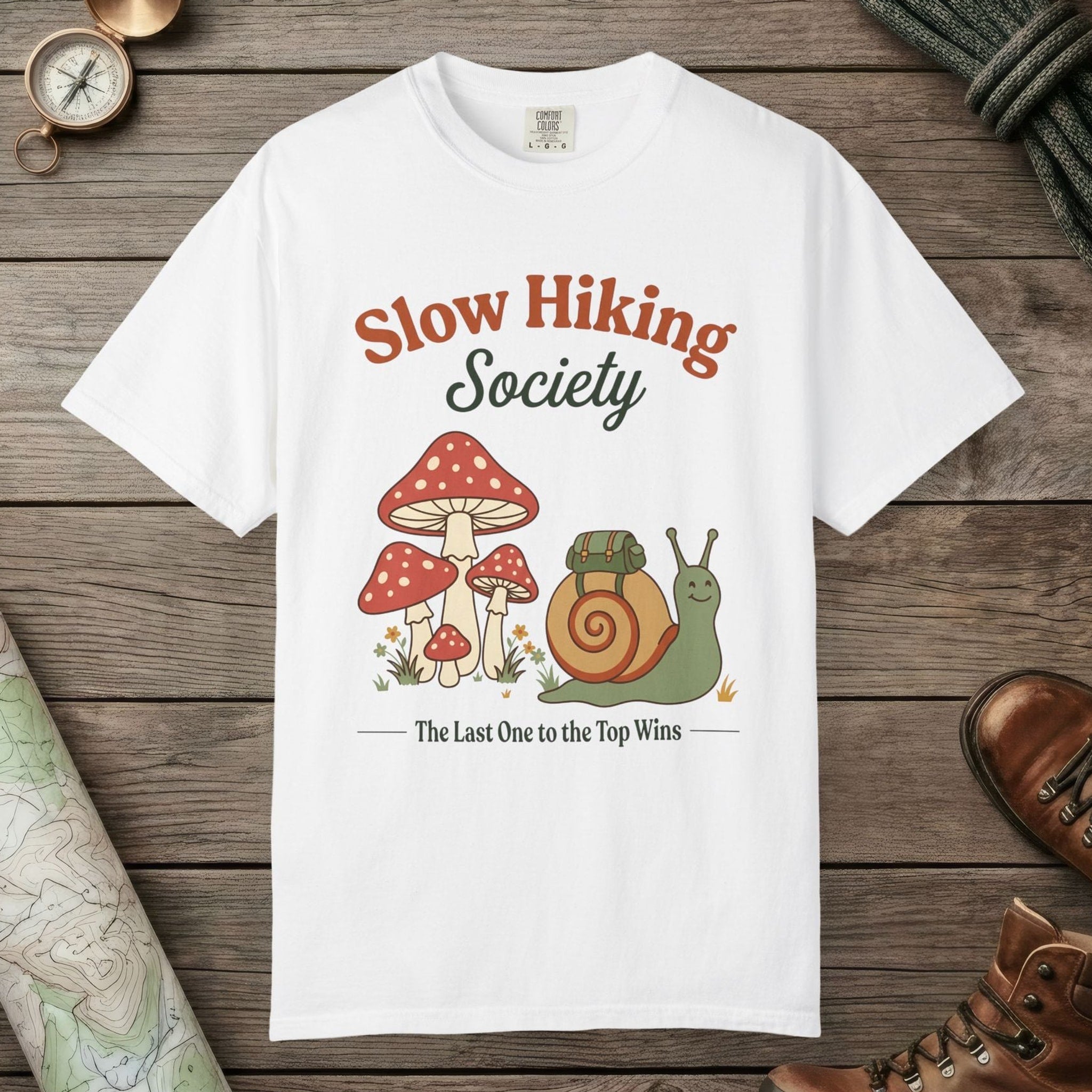 White color unisex graphic t-shirt with "Slow Hiking Society" design