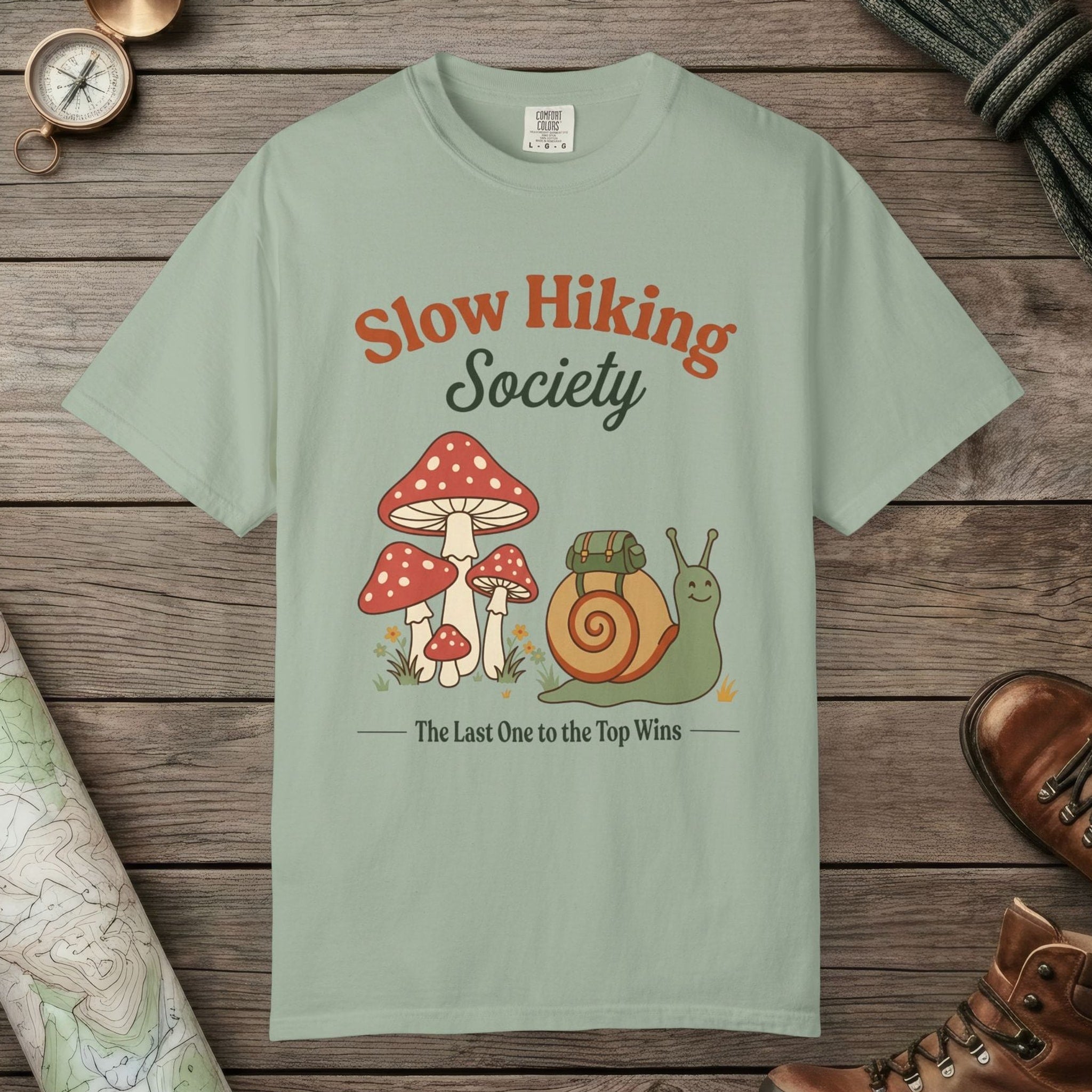 Bay color unisex graphic t-shirt with "Slow Hiking Society" design
