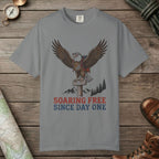 Grey color unisex graphic t-shirt with "Soaring Free" design