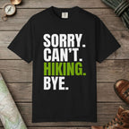 Black color unisex graphic t-shirt with "Sorry. Can't. Hiking." design