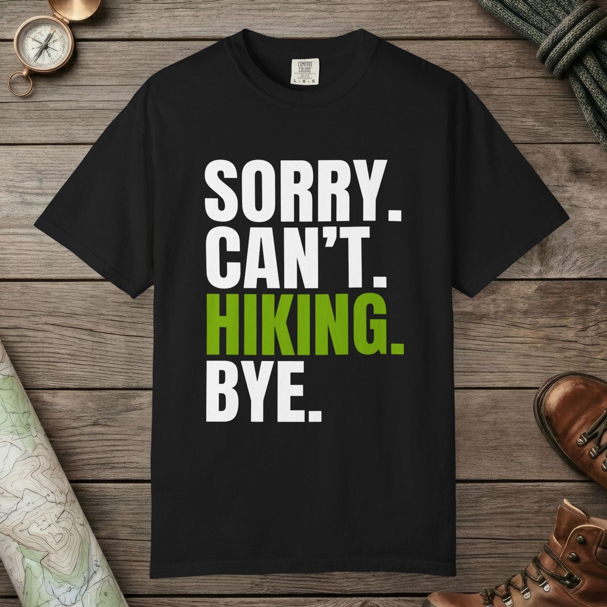 Black color unisex graphic t-shirt with "Sorry. Can't. Hiking." design