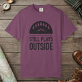 Berry color unisex graphic t-shirt with "Still Plays Outside" design