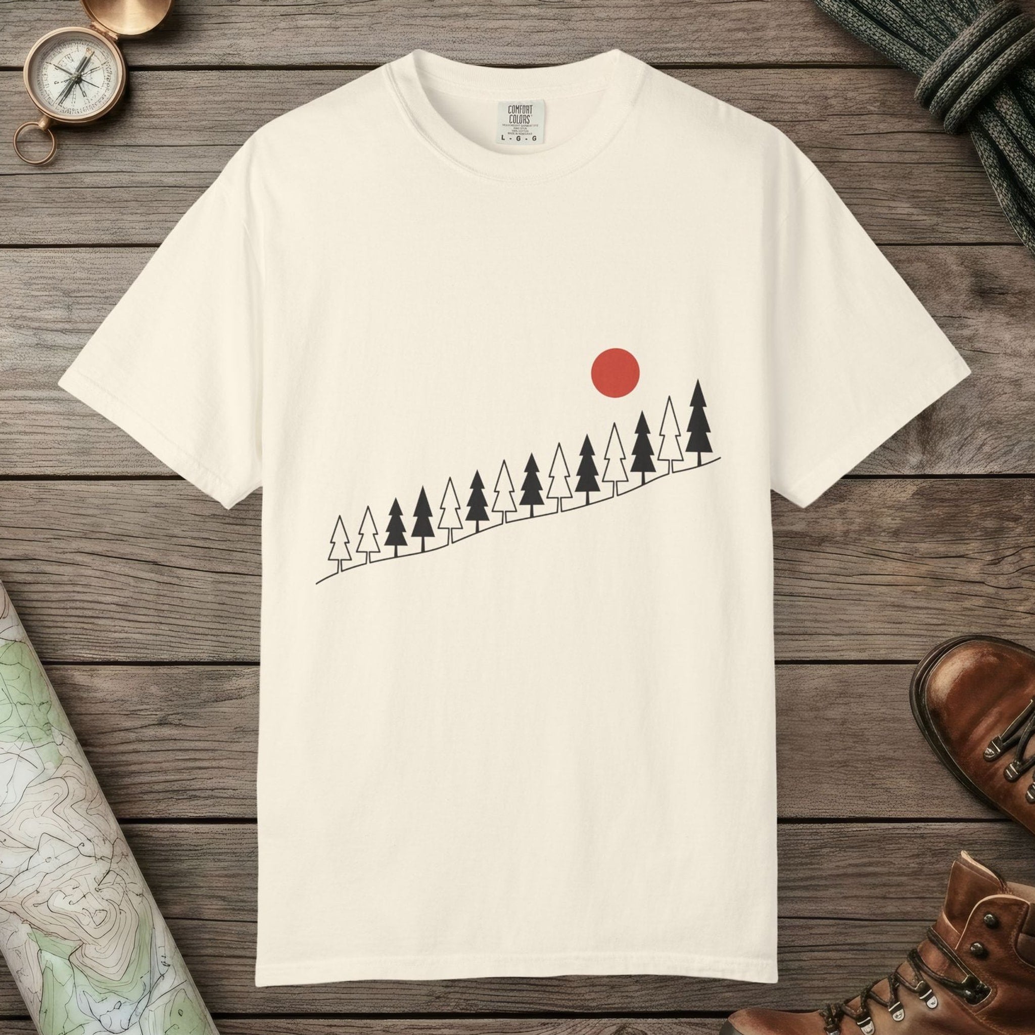 Ivory color unisex graphic t-shirt with "Sunrise Pine" design