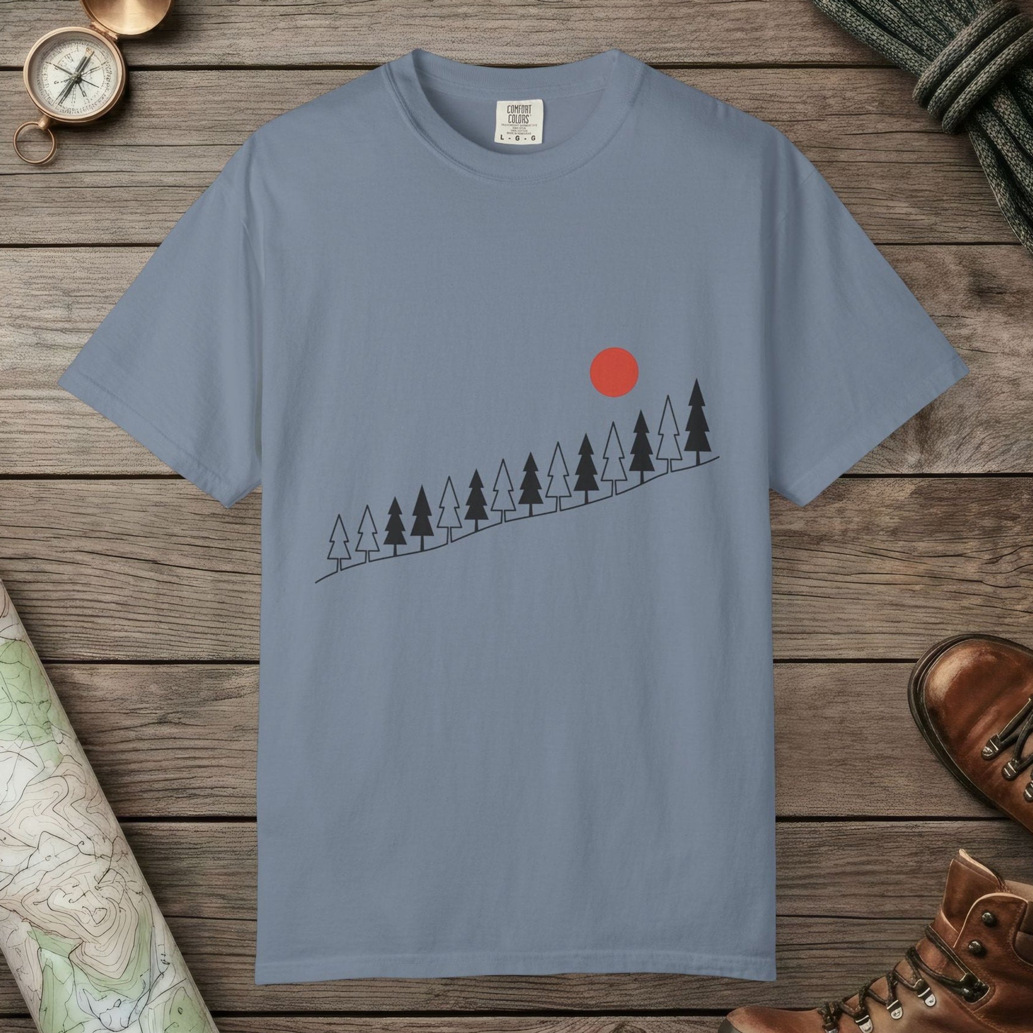 Blue Jean color unisex graphic t-shirt with "Sunrise Pine" design