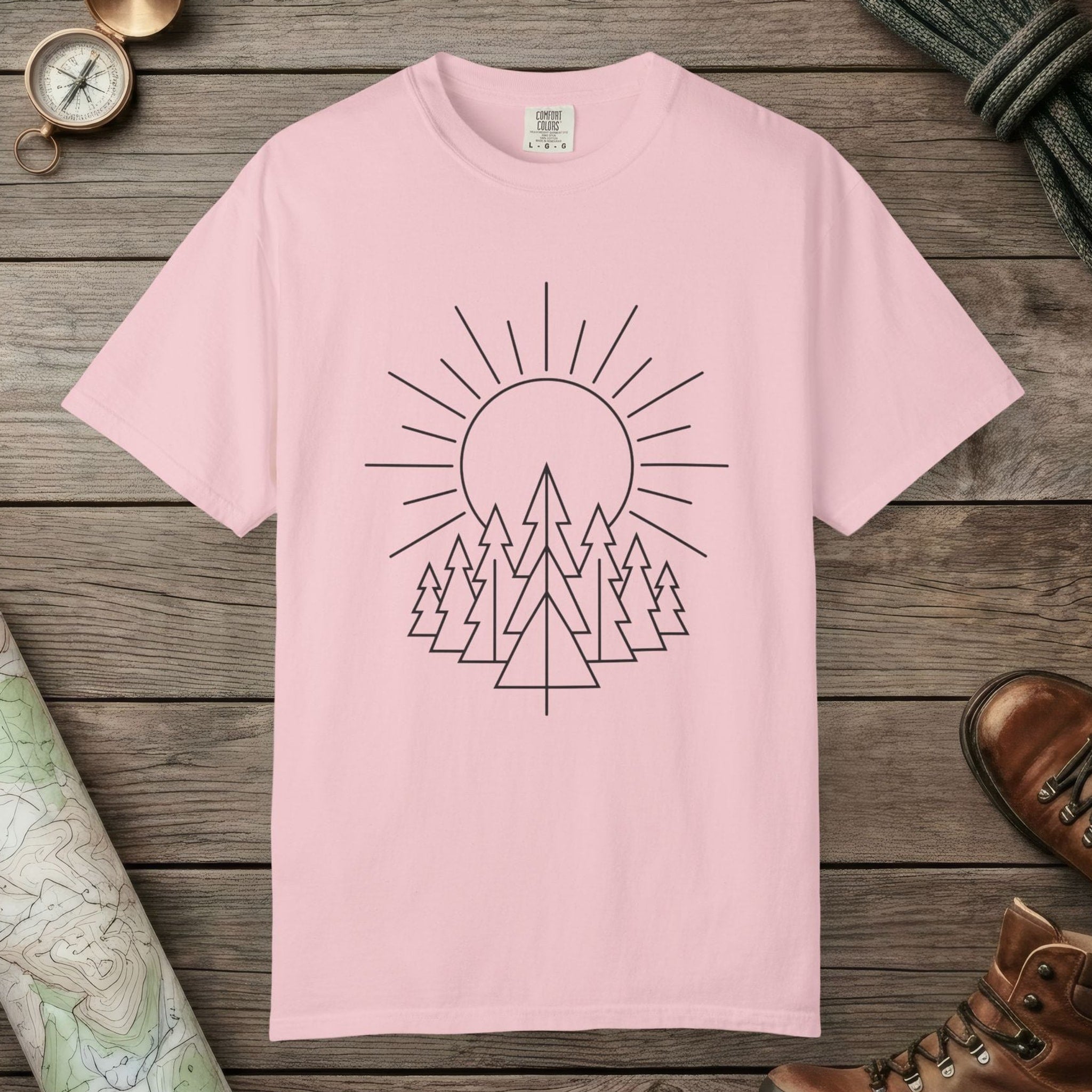 Blossom color unisex graphic t-shirt with "Sunrise Pine" design
