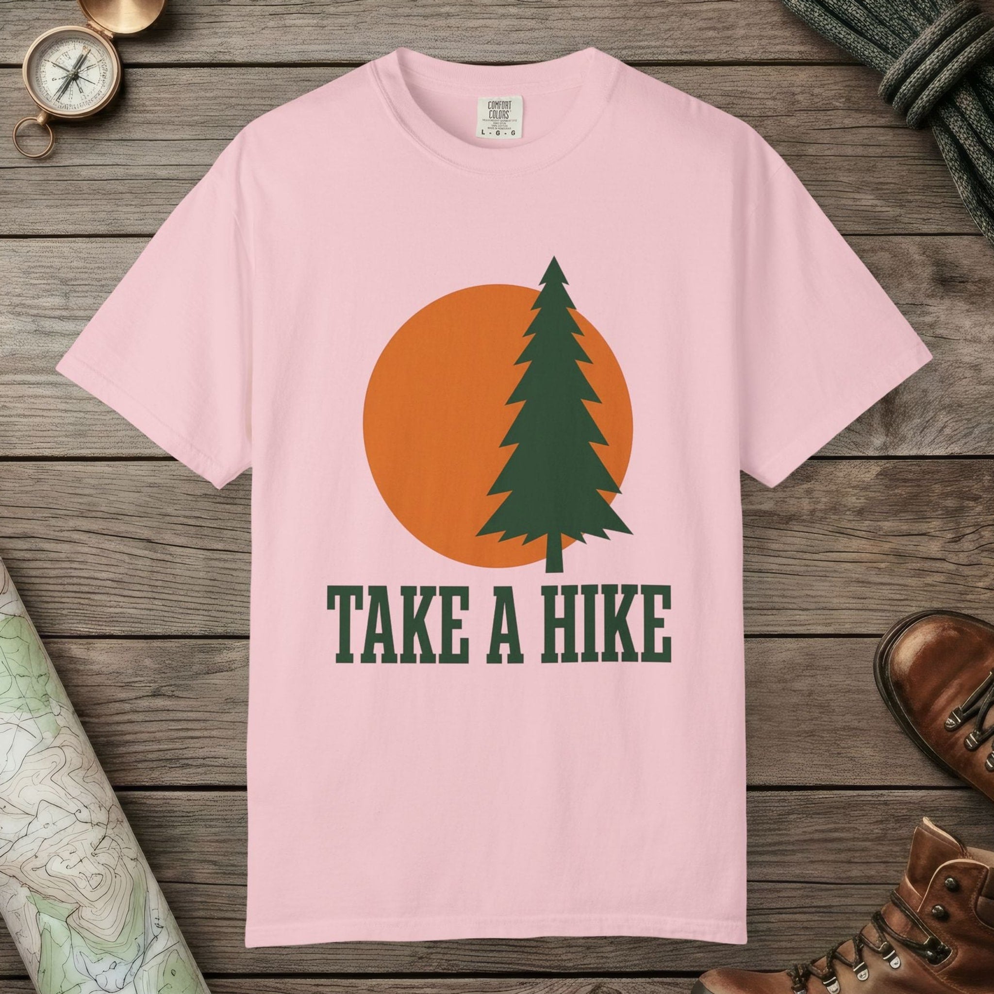 Blossom color unisex graphic t-shirt with "Take A Hike" design