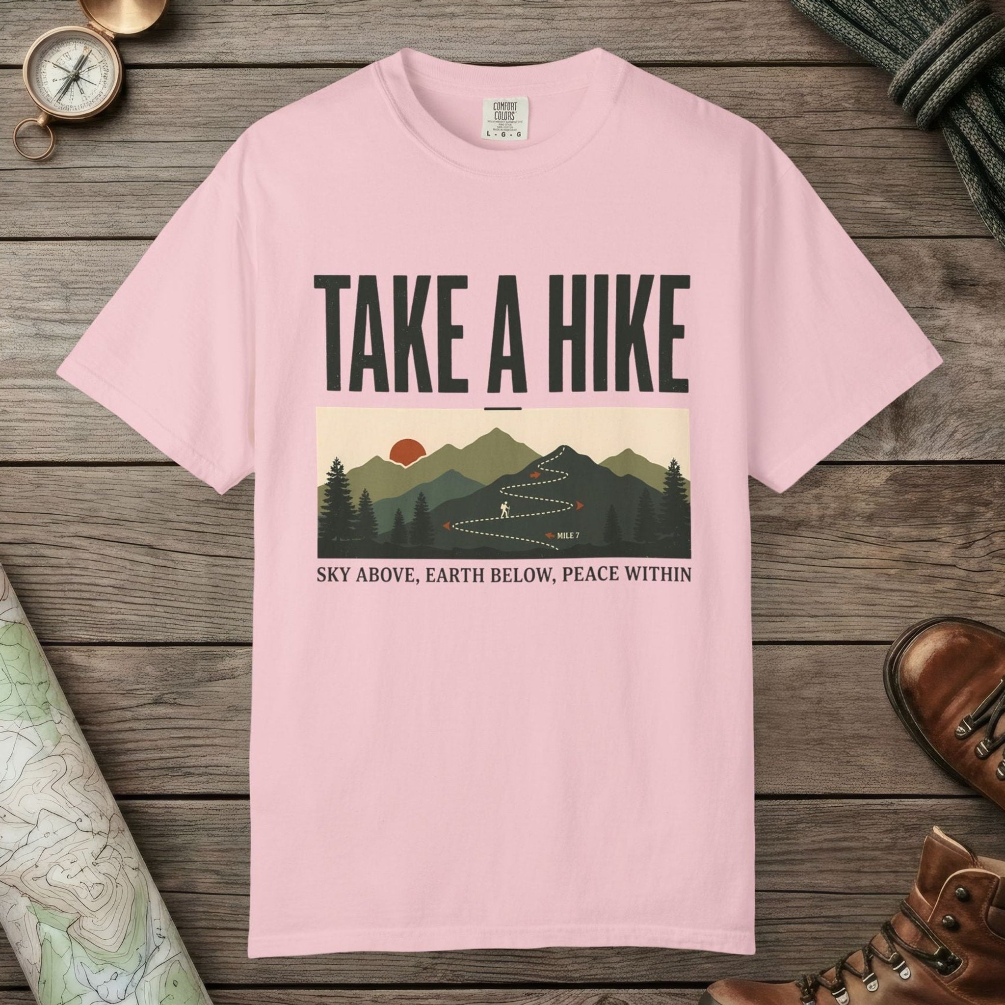 Blossom color unisex graphic t-shirt with "Take A Hike" design