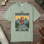 Bay color unisex graphic t-shirt with "The Meowntains Are Calling" design