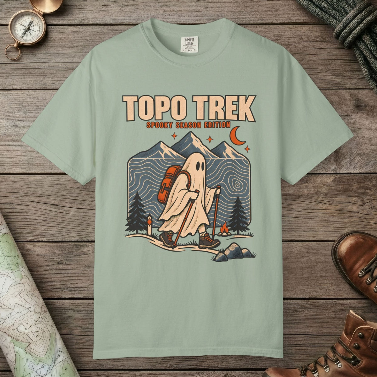 Bay color unisex graphic t-shirt with "Topo Ghost Trek" design