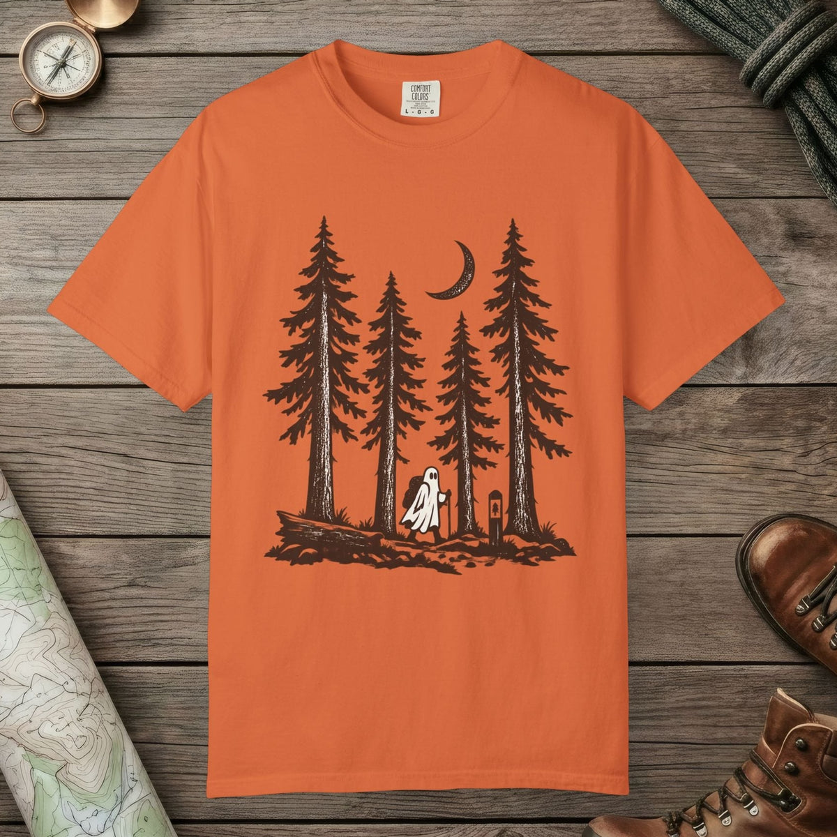 Burnt Orange color unisex graphic t-shirt with "Trail Ghost" design