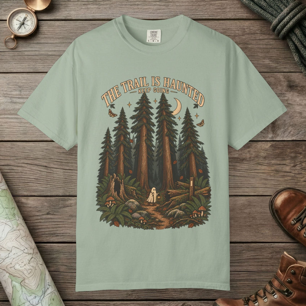 Bay color unisex graphic t-shirt with "Trail Is Haunted" design