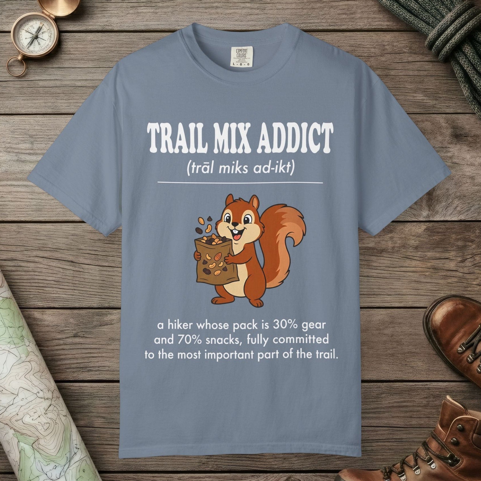 Blue Jean color unisex graphic t-shirt with "Trail Mix Addict Definition" design