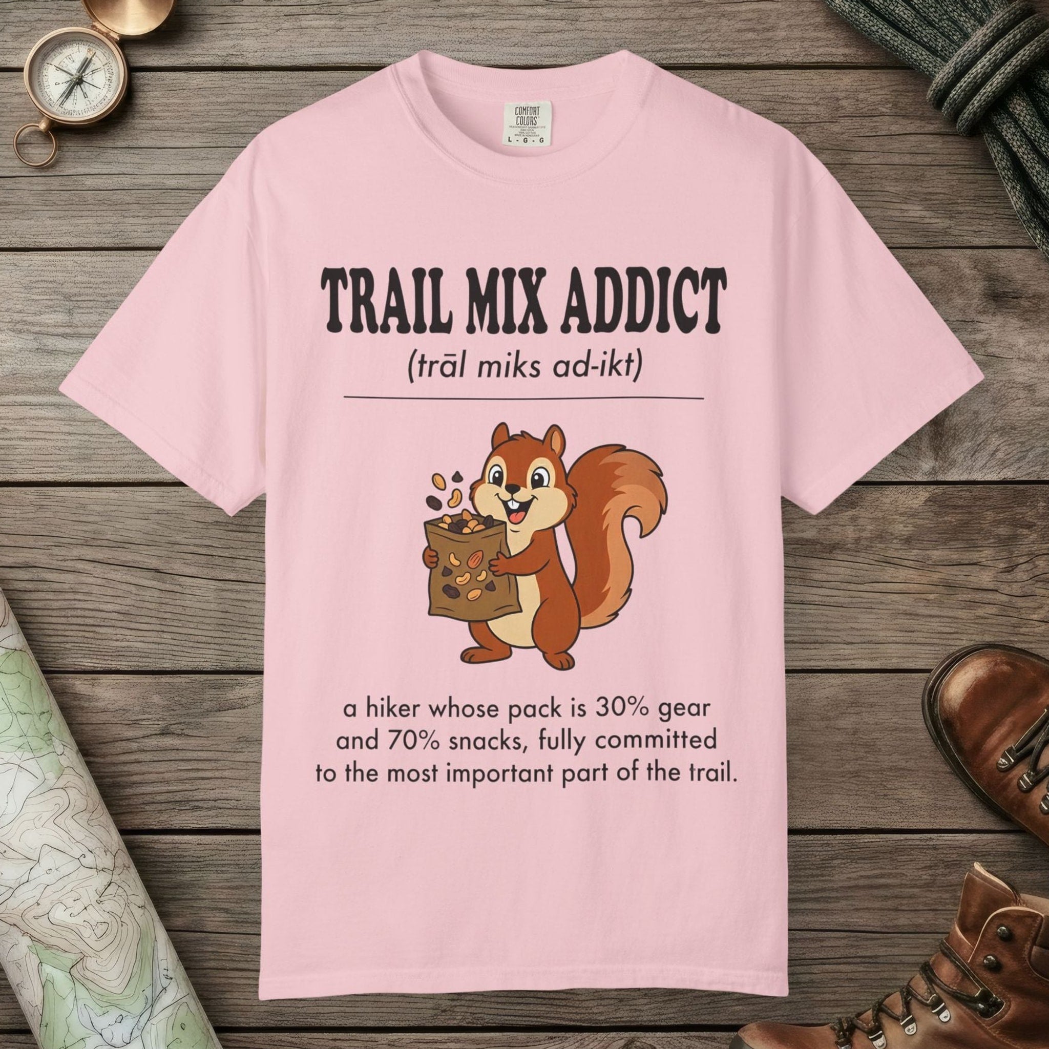 Blossom color unisex graphic t-shirt with "Trail Mix Addict Definition" design