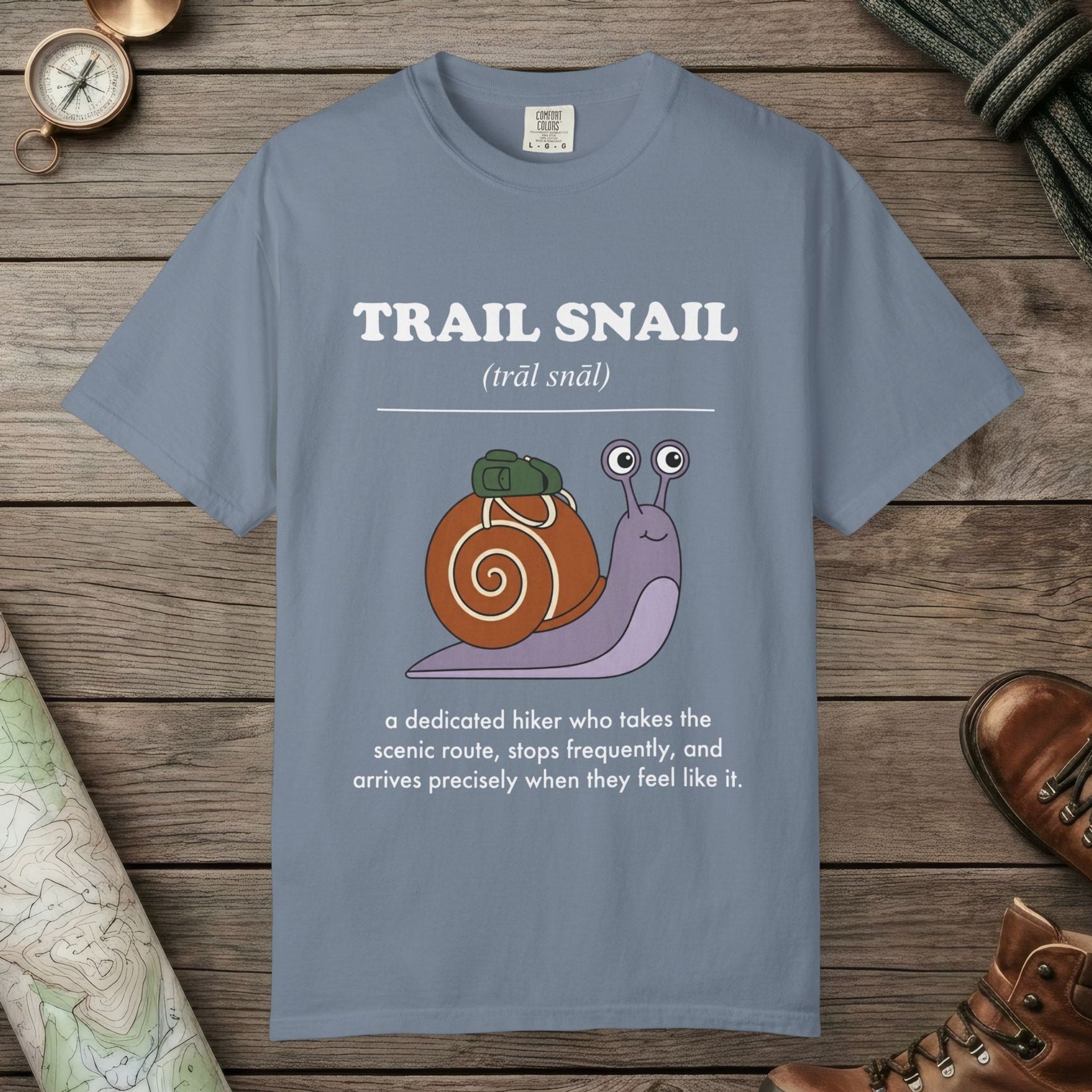 Blue Jean color unisex graphic t-shirt with "Trail Snail Definition" design