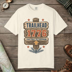 Ivory color unisex graphic t-shirt with "Trailhead 1776" design