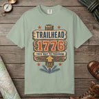 Bay color unisex graphic t-shirt with "Trailhead 1776" design