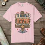 Blossom color unisex graphic t-shirt with "Trailhead 1776" design