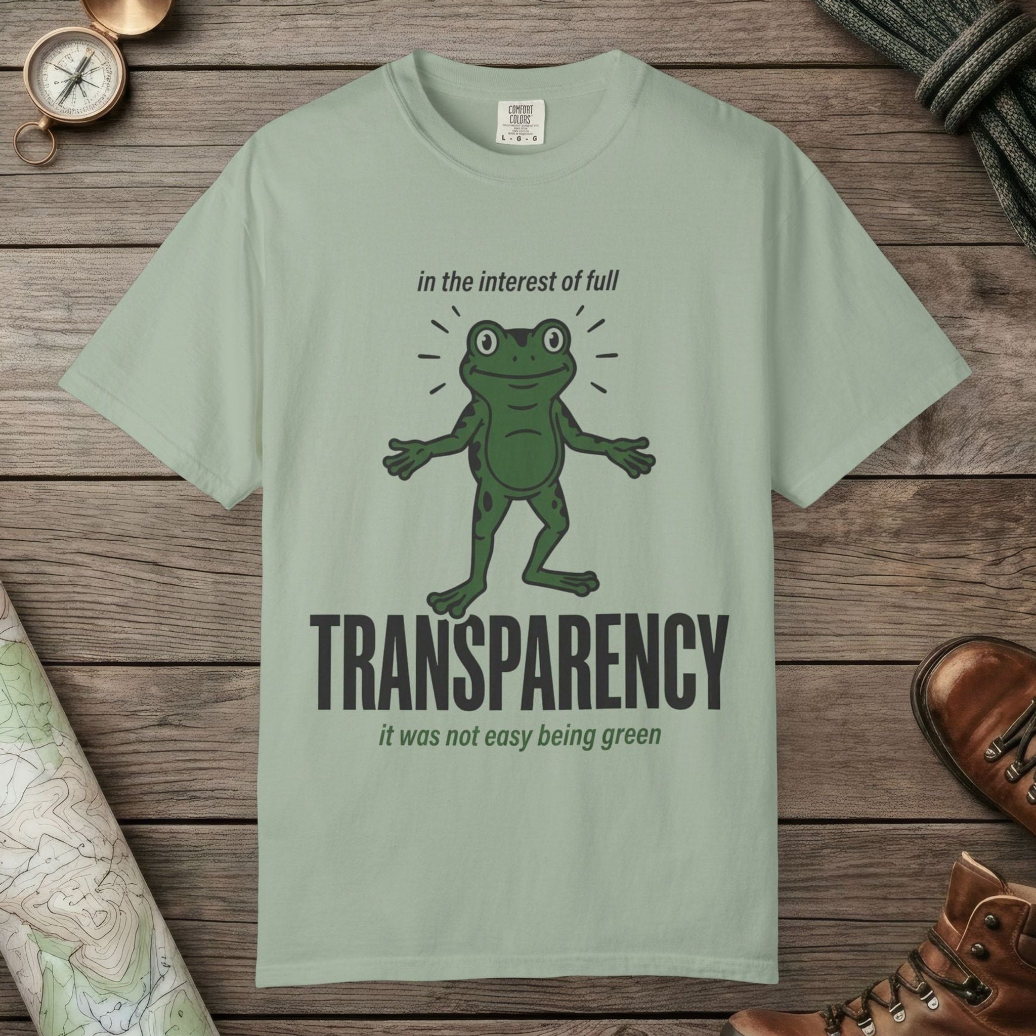 Bay color unisex graphic t-shirt with "Transparent About It Frog" design